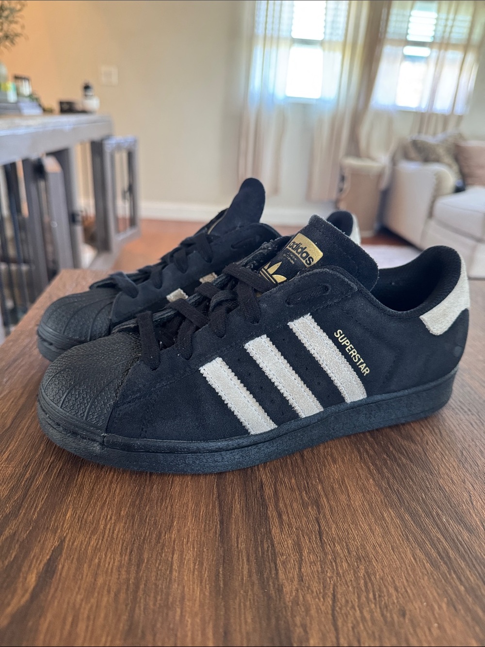 adidas Superstar Low-Top Sneakers in Black and Beige